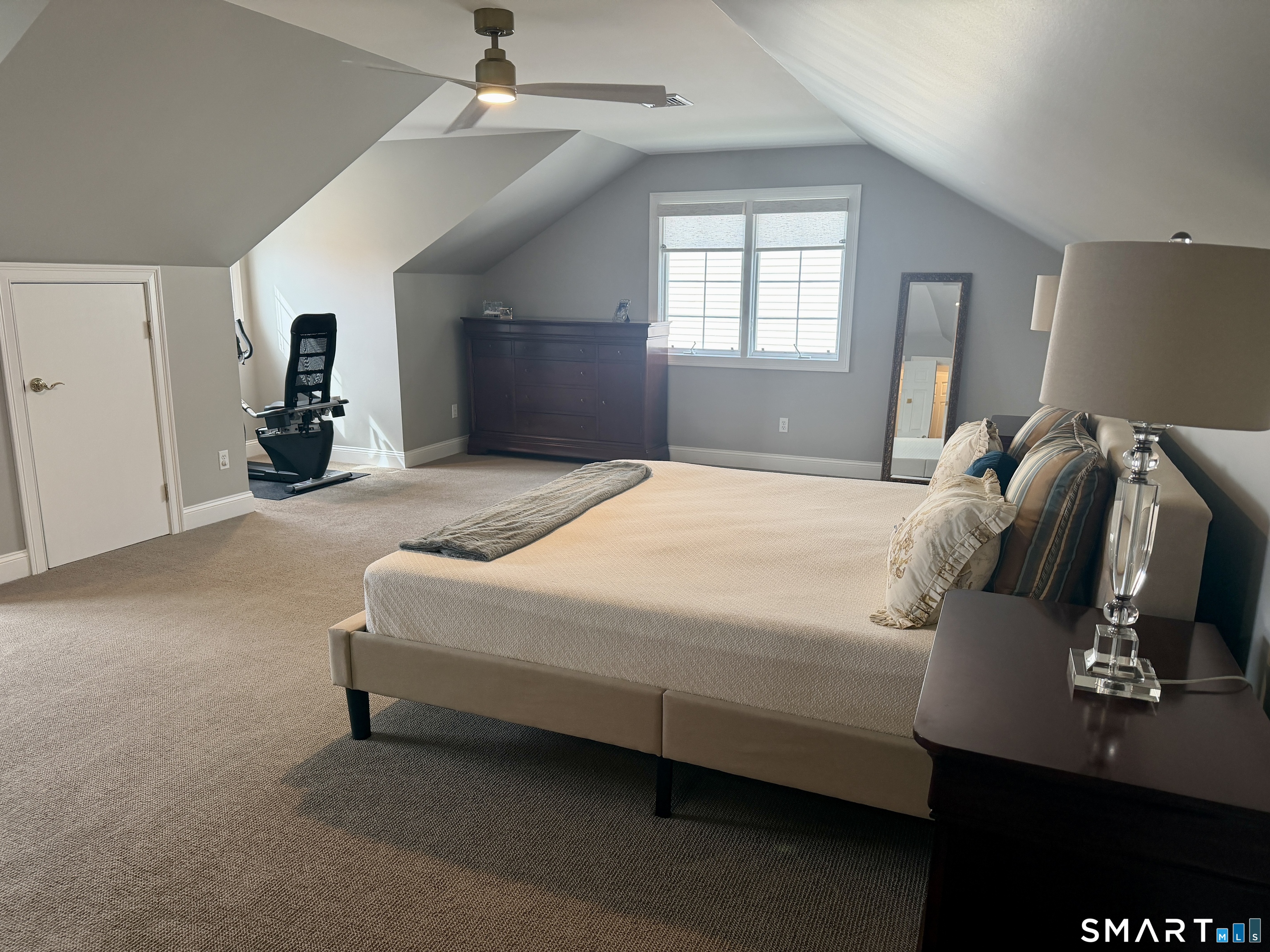 6 Winding Way, Unit 6 Trumbull, CT 06611 - Photo 27 of 37 a bedroom with a bed and window