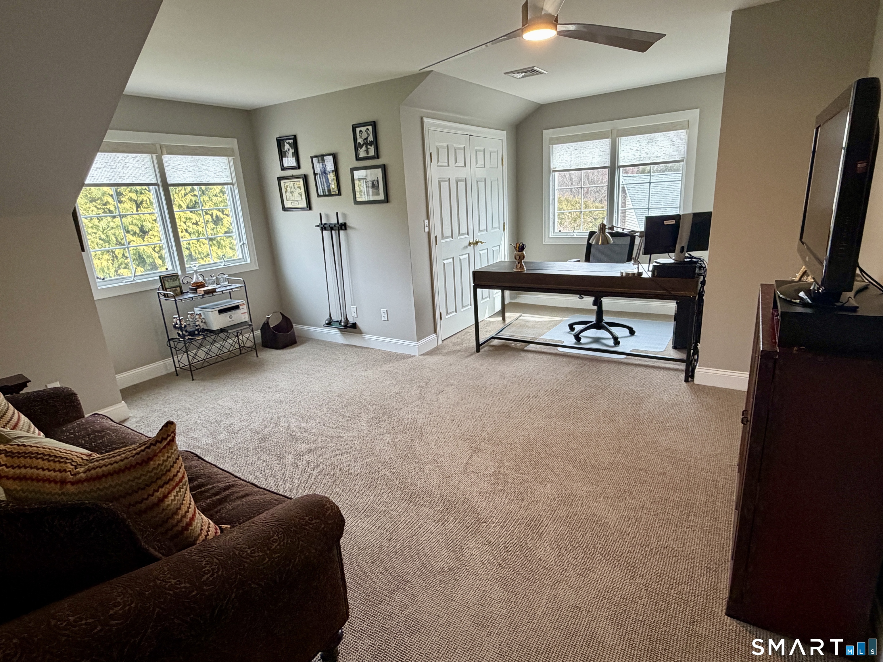 6 Winding Way, Unit 6 Trumbull, CT 06611 - Photo 30 of 37 a living room with furniture and a flat screen tv
