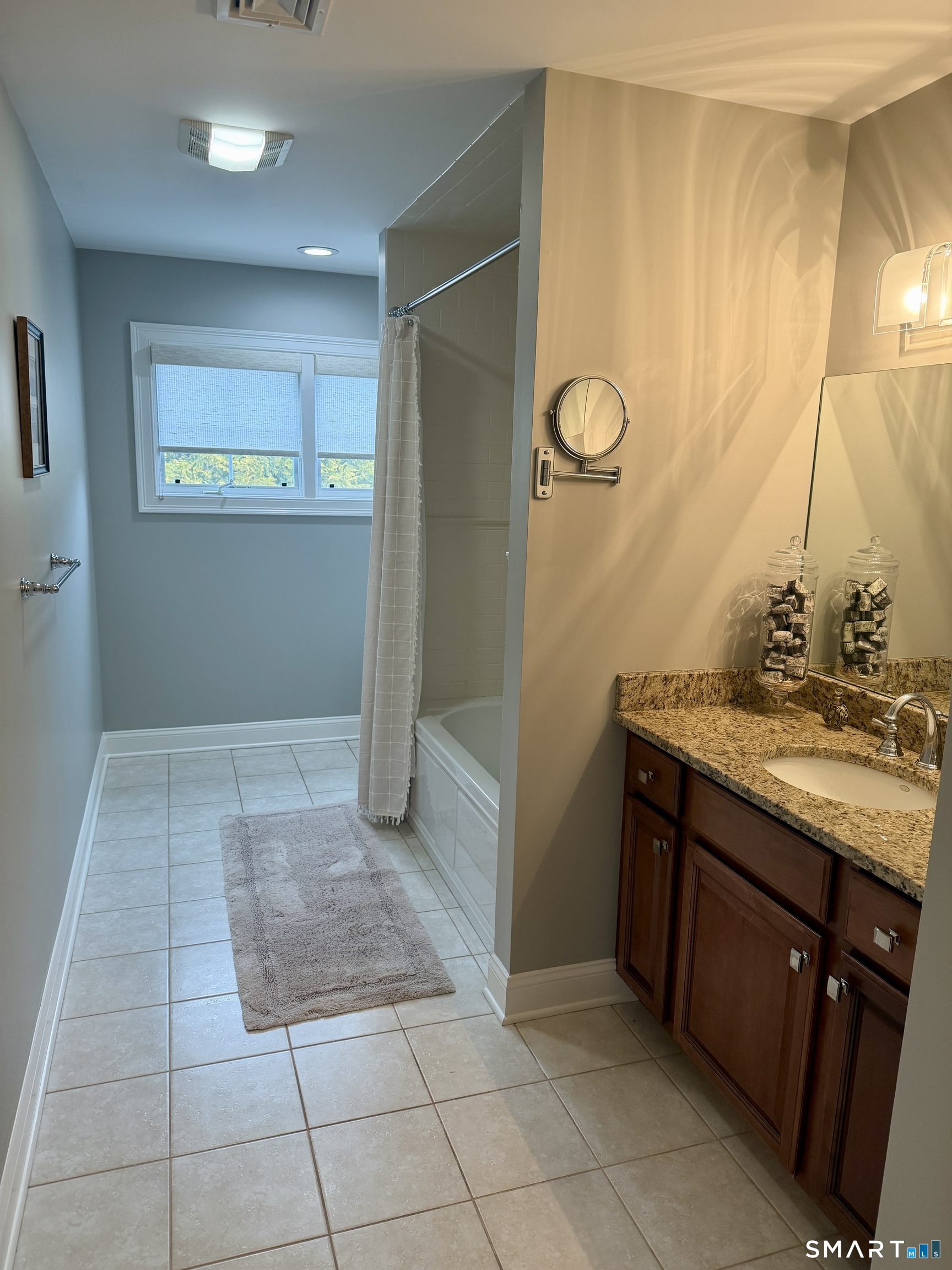 6 Winding Way, Unit 6 Trumbull, CT 06611 - Photo 31 of 37 a bathroom with a sink a mirror and a shower