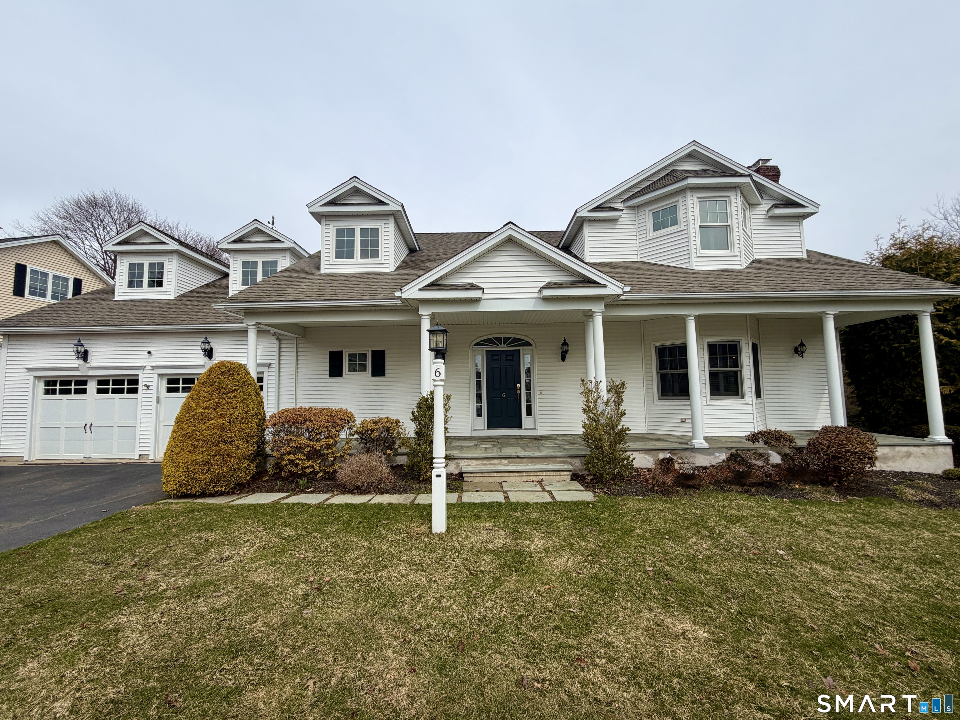 6 Winding Way, Unit 6 Trumbull, CT 06611 - Photo 35 of 37 front view of a house with a garden