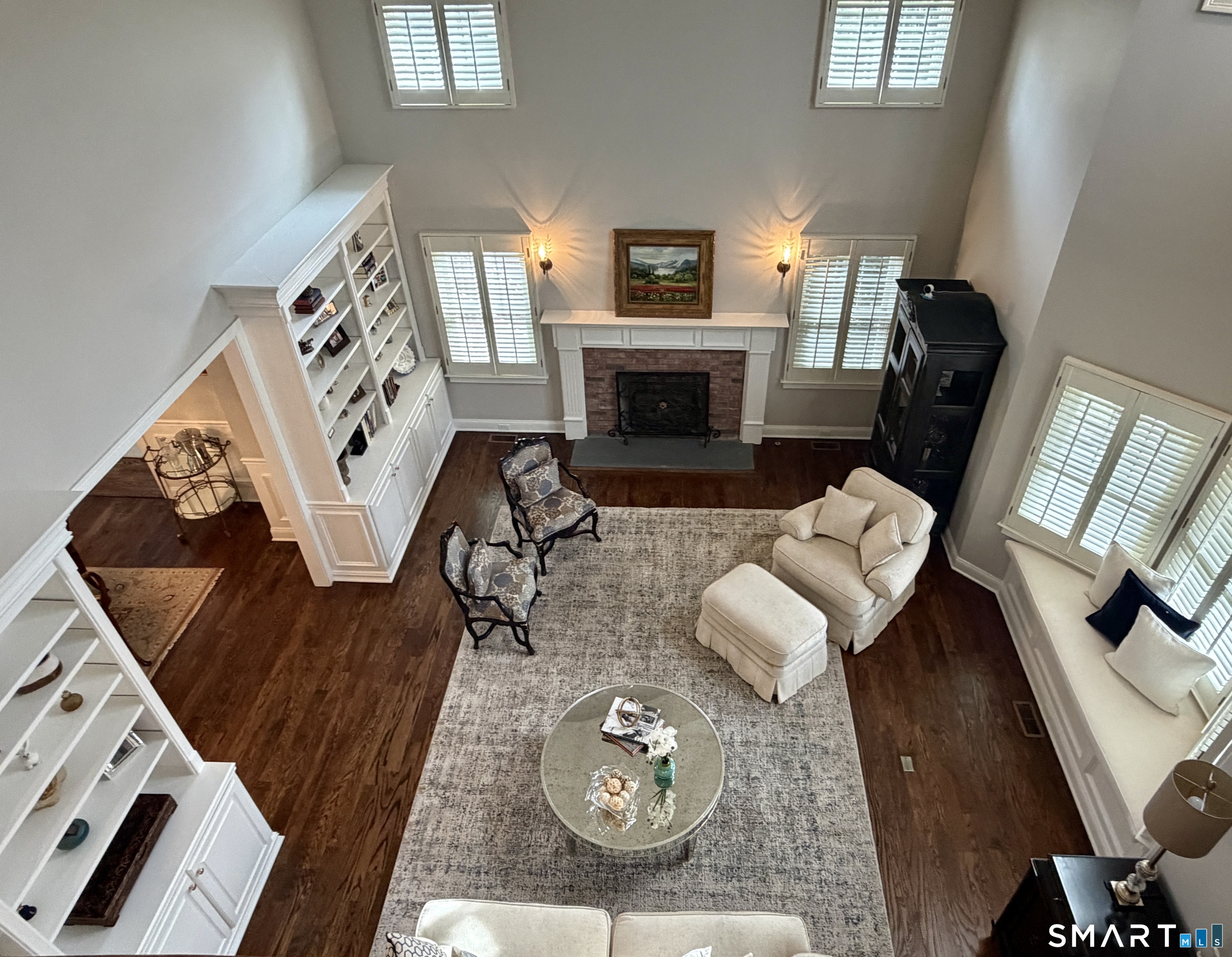 6 Winding Way, Unit 6 Trumbull, CT 06611 - Photo 7 of 37 a living room with furniture and a fireplace