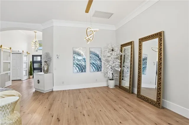 a view of livingroom with furniture and wooden floor