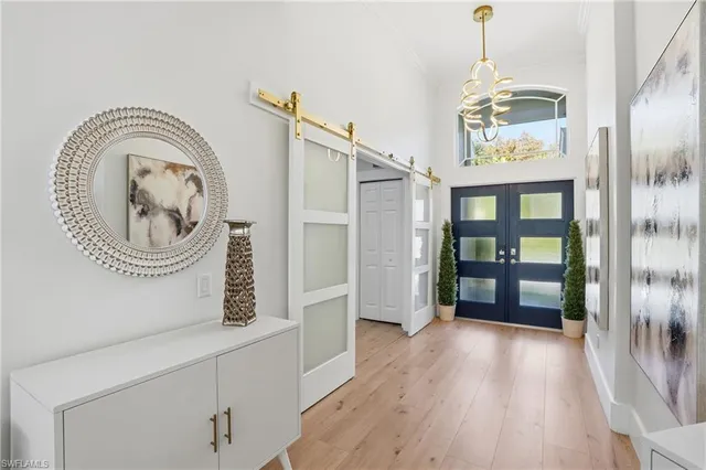 a view of entryway with wooden floor