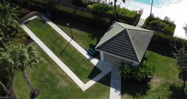 a view of a yard from a terrace
