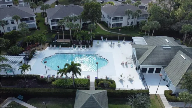 an aerial view of multiple houses with outdoor space