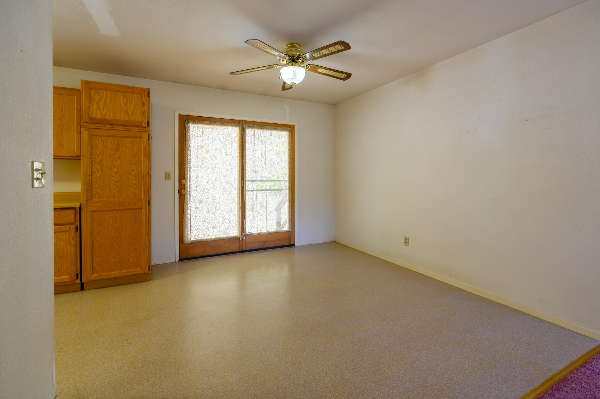 2307 Goose Ranch Road Lewiston, CA 96052 - Photo 13 of 37 an empty room with a window and a ceiling fan