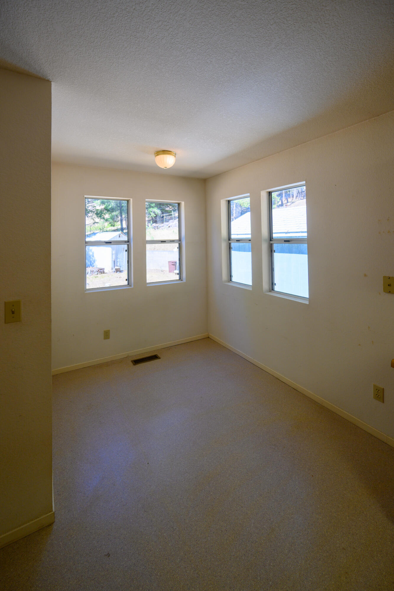 2307 Goose Ranch Road Lewiston, CA 96052 - Photo 19 of 37 an empty room with windows