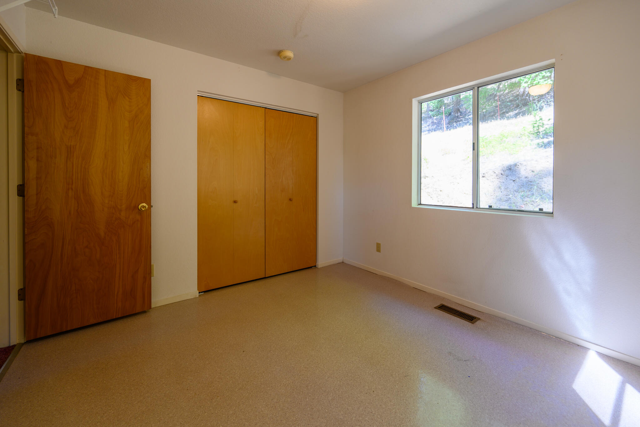 2307 Goose Ranch Road Lewiston, CA 96052 - Photo 26 of 37 an empty room with windows