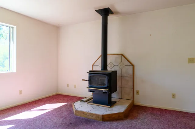 a living room with a fireplace