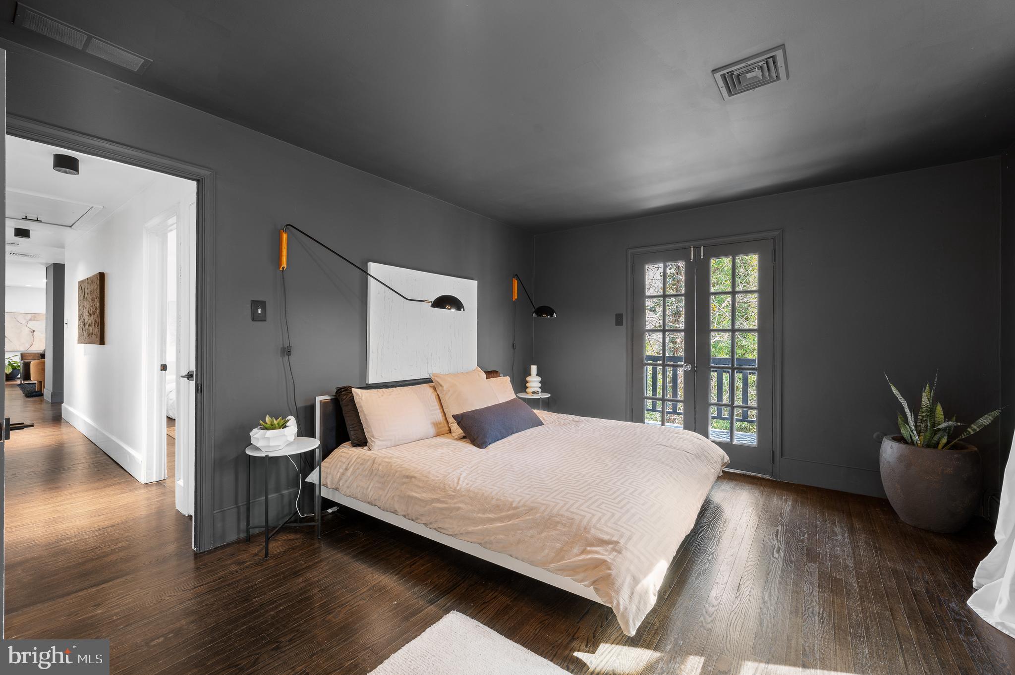 425 Oak Valley Road Media, PA 19063 - Photo 15 of 48 a bedroom with a bed and wooden floor