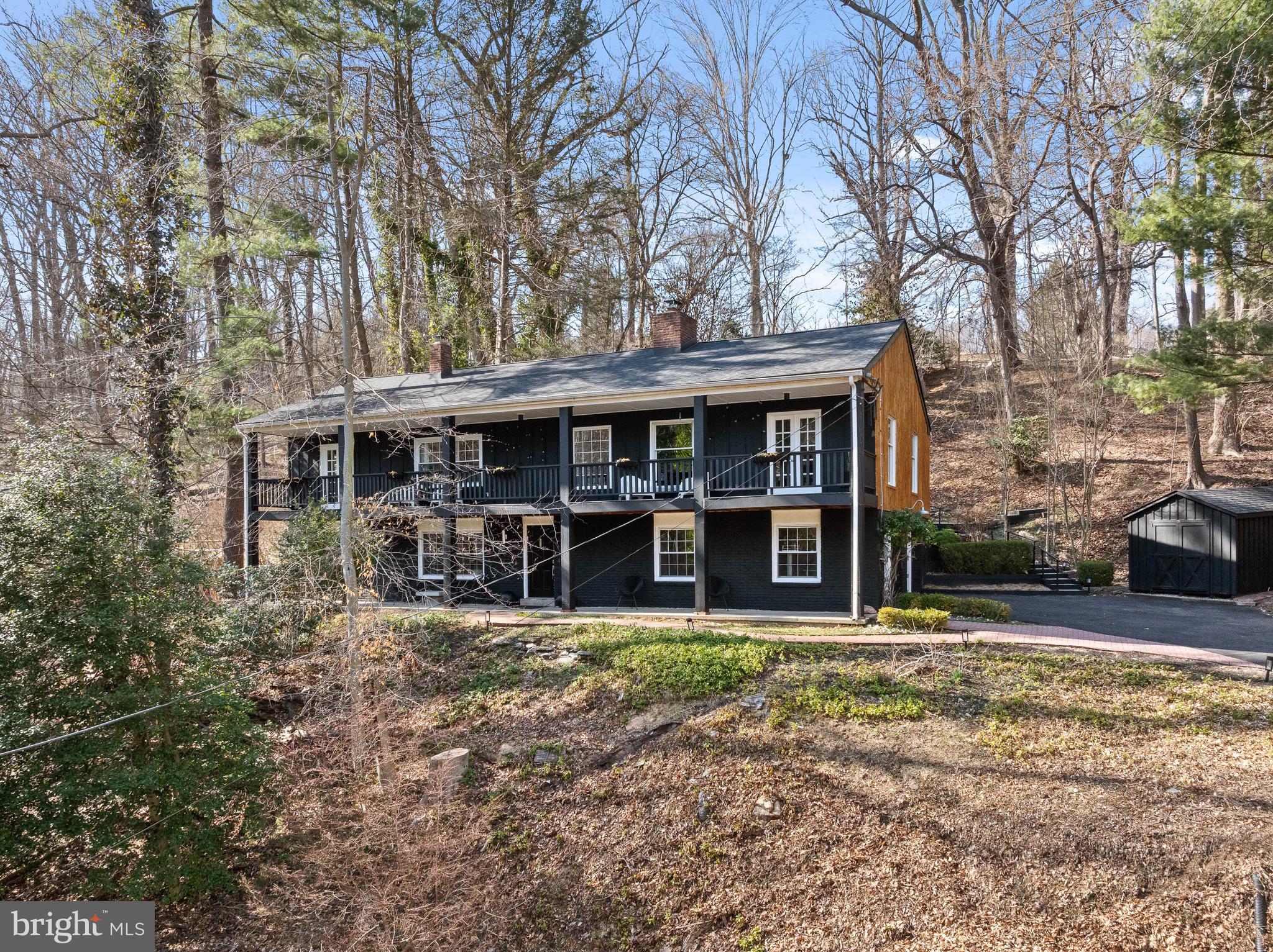 425 Oak Valley Road Media, PA 19063 - Photo 44 of 48 a view of a house with backyard porch and sitting area