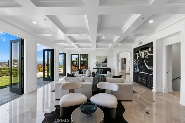 a living room with furniture a fireplace and a fireplace