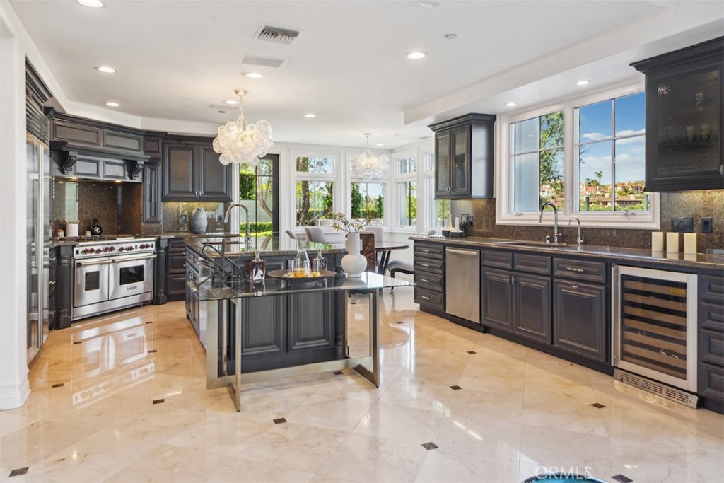 28 Shoreridge Newport Coast, CA 92657 - Photo 18 of 75 Formal kitchen with Talia lighting, Wolf, Sub Zero, Waterworks.