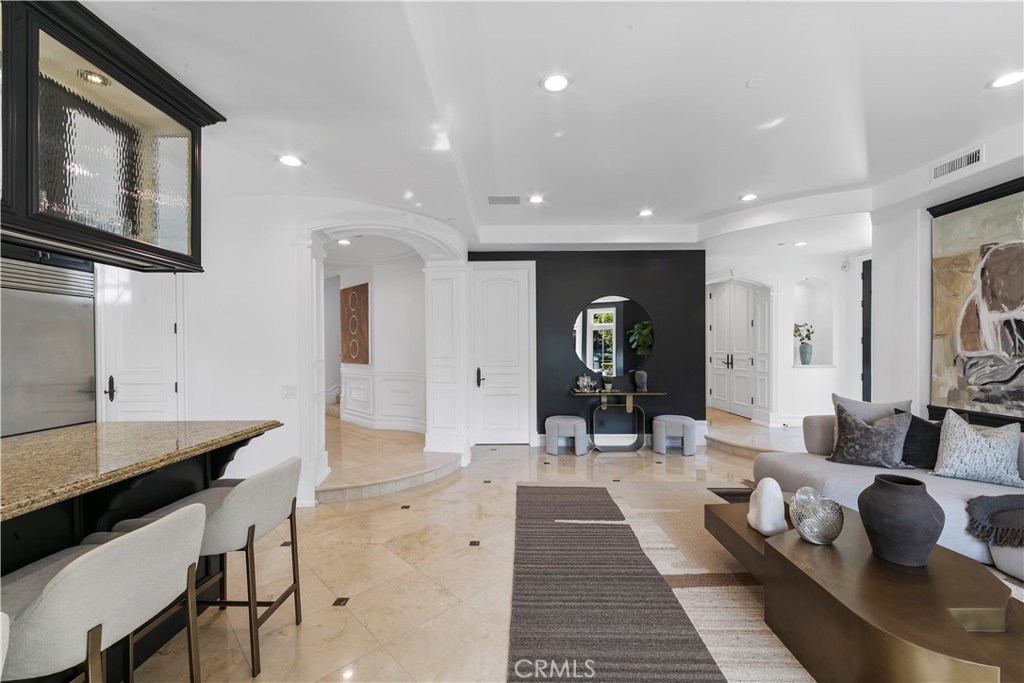 28 Shoreridge Newport Coast, CA 92657 - Photo 33 of 75 The multigenerational wing has a private entrance, door separation from the rest of the estate and ensuite bathroom.