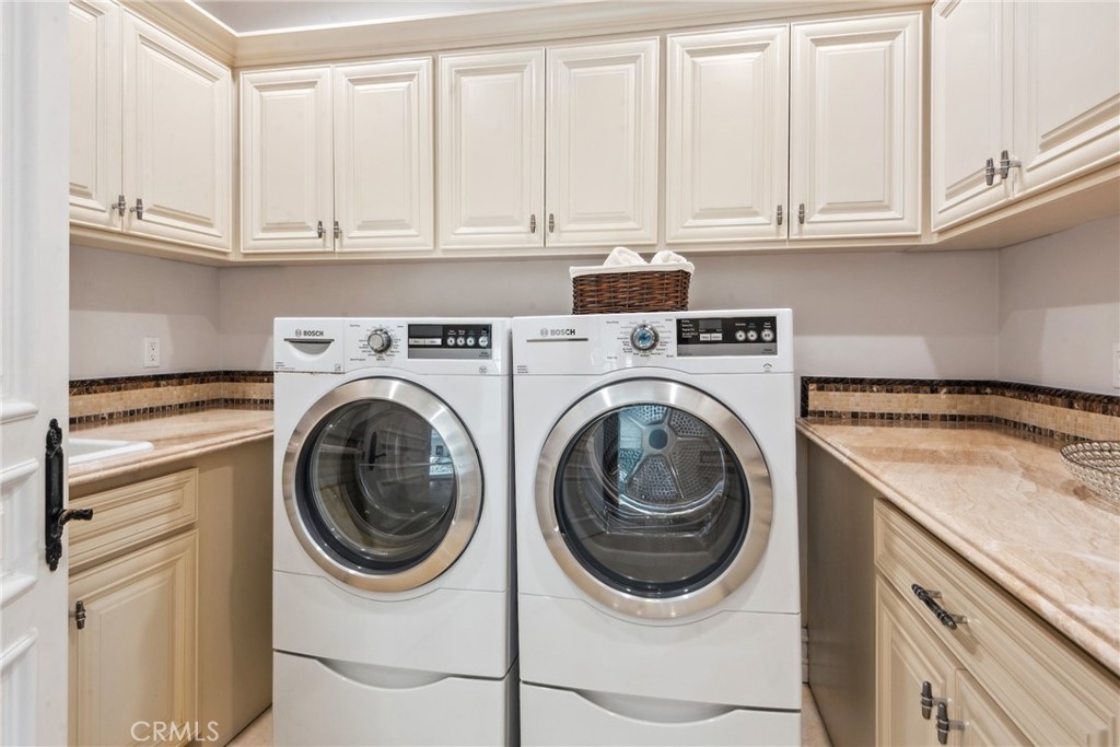 28 Shoreridge Newport Coast, CA 92657 - Photo 37 of 75 3rd Level Laundry room with sink