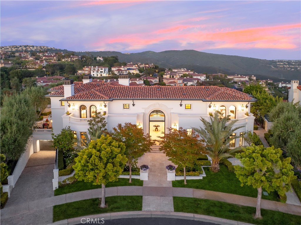 28 Shoreridge Newport Coast, CA 92657 - Photo 4 of 75 Drone Twilight at front 28 Shoreridge Legacy Estate with Curated Gardens.