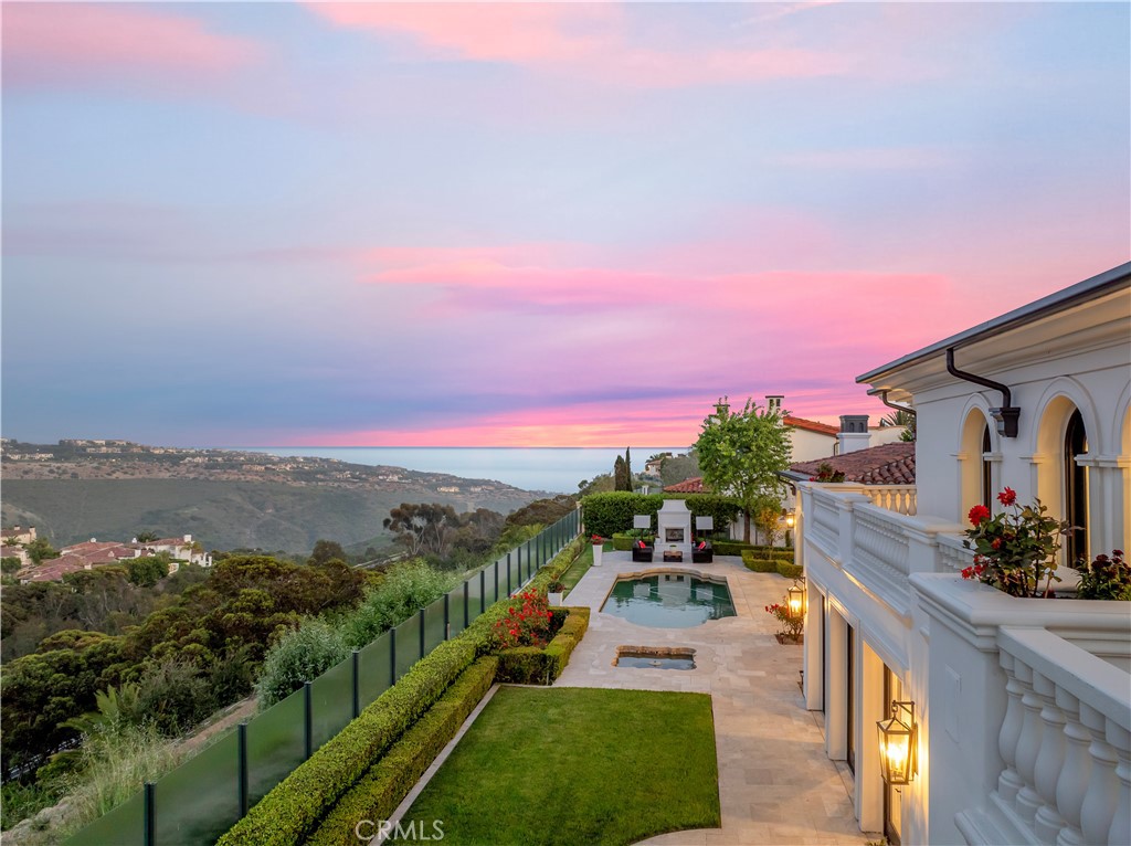 28 Shoreridge Newport Coast, CA 92657 - Photo 70 of 75 Drone views from the primary balcony location at twilight.