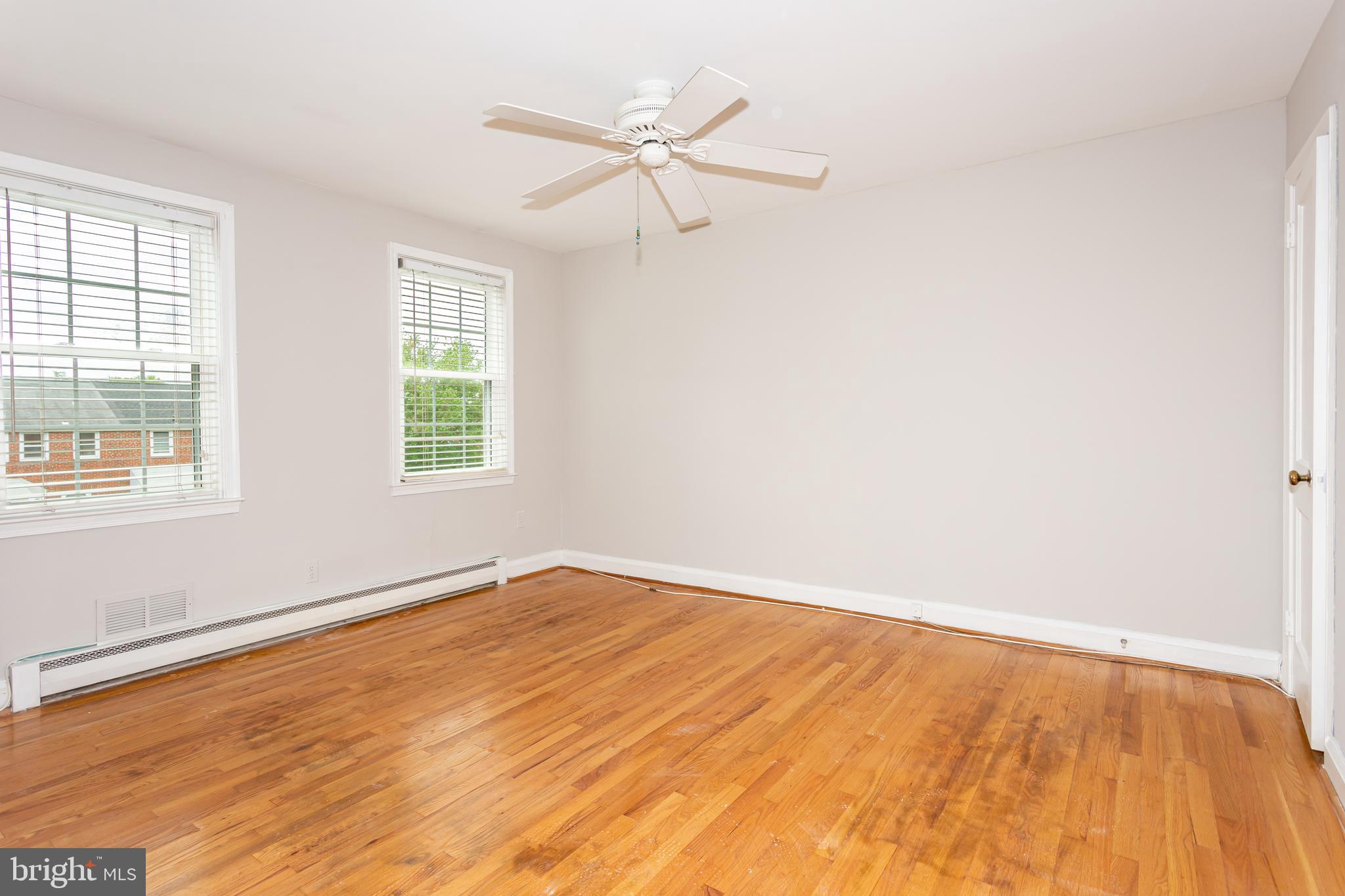 8426 Pleasant Plains Road Towson, MD 21286 - Photo 9 of 25 Upper 1 - Primary bedroom with ceiling fan