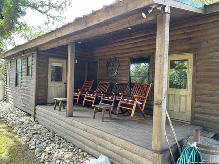 a view of a outdoor seating area with furniture