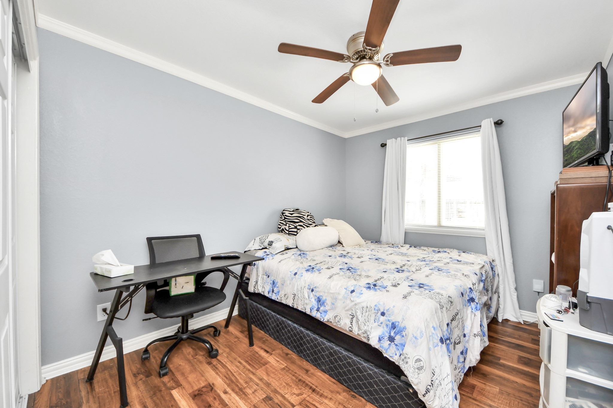 1359 Littleport Lane Channelview, TX 77530 - Photo 14 of 32 a bedroom that has a bed and a chair in it