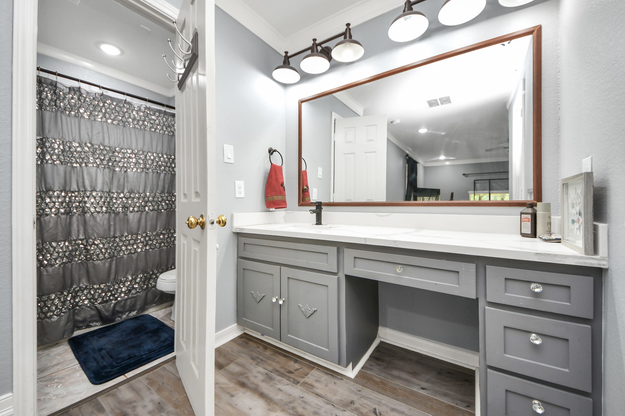 1359 Littleport Lane Channelview, TX 77530 - Photo 17 of 32 a bathroom with a double vanity sink mirror and shower
