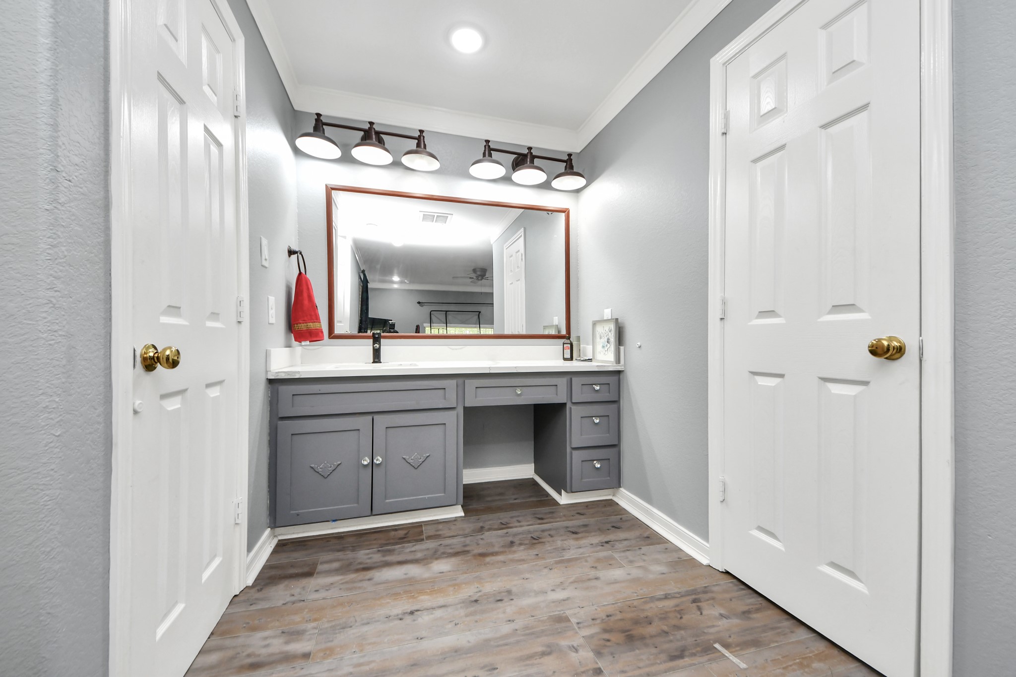 1359 Littleport Lane Channelview, TX 77530 - Photo 18 of 32 a bathroom with a sink and a mirror