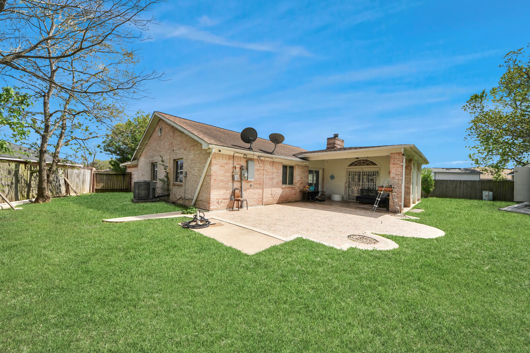 1359 Littleport Lane Channelview, TX 77530 - Photo 26 of 32 a front view of a house with a yard
