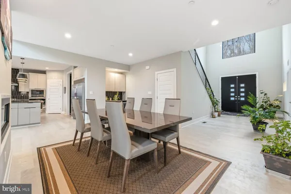 a living room with furniture and flat screen tv
