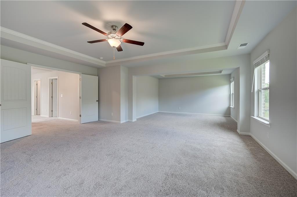 343 Linford Drive Locust Grove, GA 30248 - Photo 27 of 36 a view of an empty room with a window