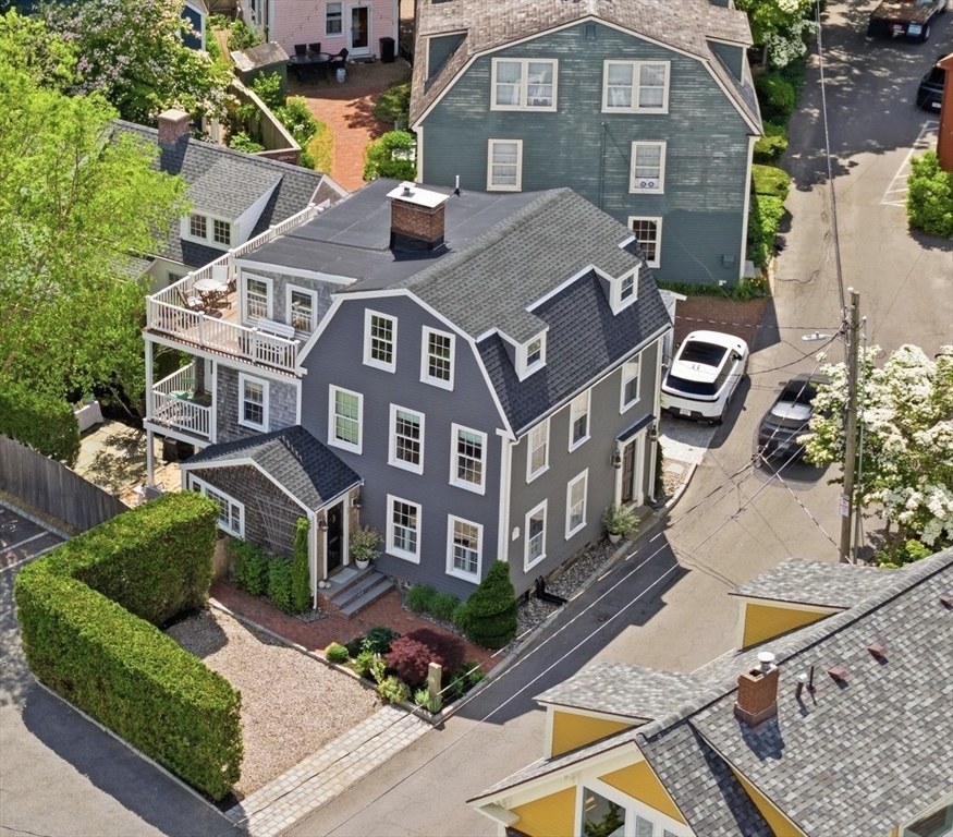33 Franklin Street Marblehead, MA 01945 - Photo 41 of 42 a aerial view of a house with swimming pool and porch