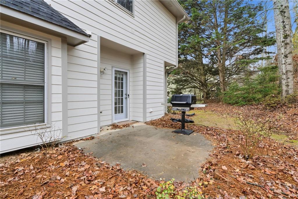5868 Valine Way Sugar Hill, GA 30518 - Photo 27 of 32 a view of a back yard of the house