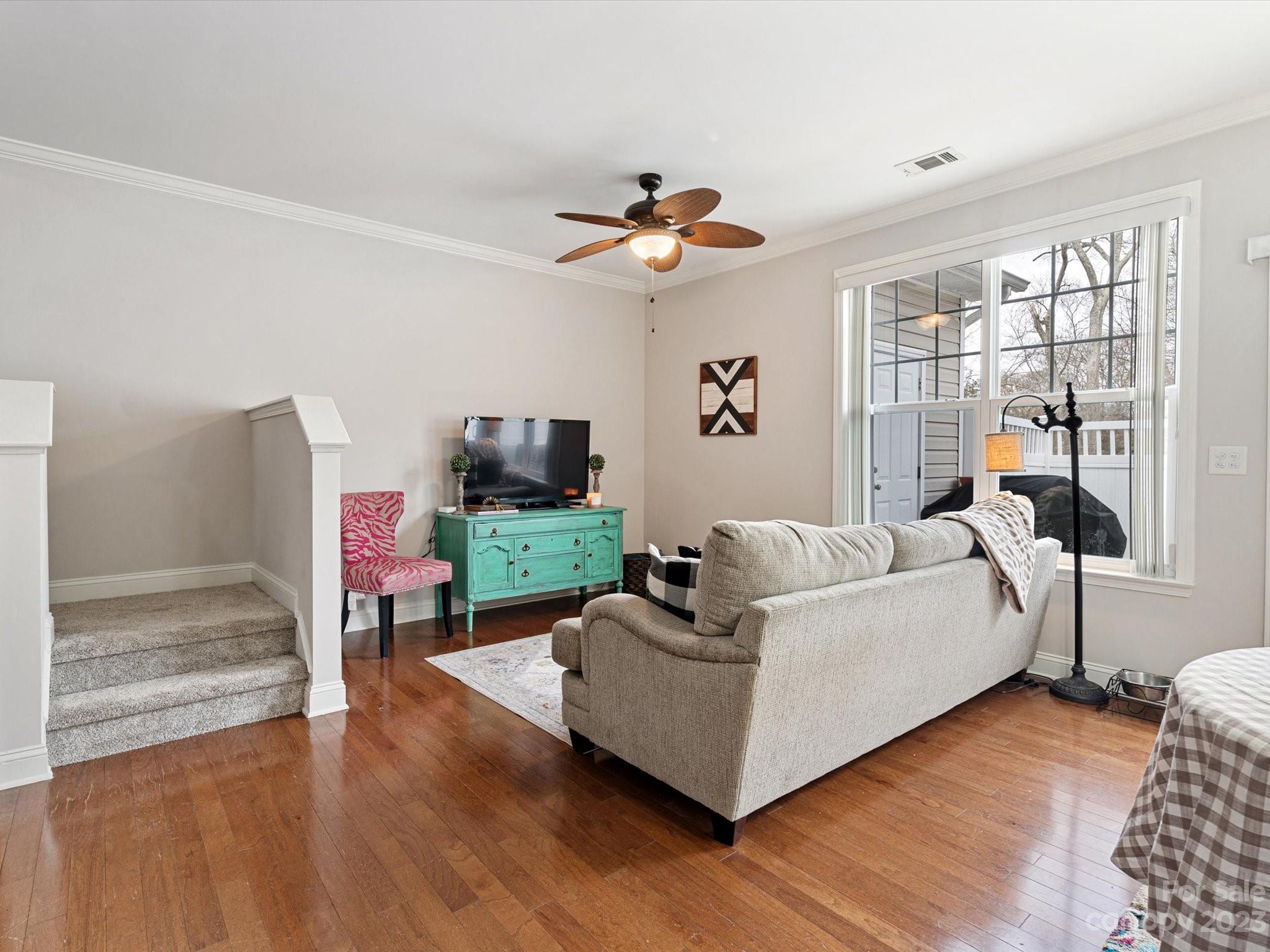 256 River Clay Road Fort Mill, SC 29708 - Photo 13 of 41 a living room with furniture a flat screen tv and a window