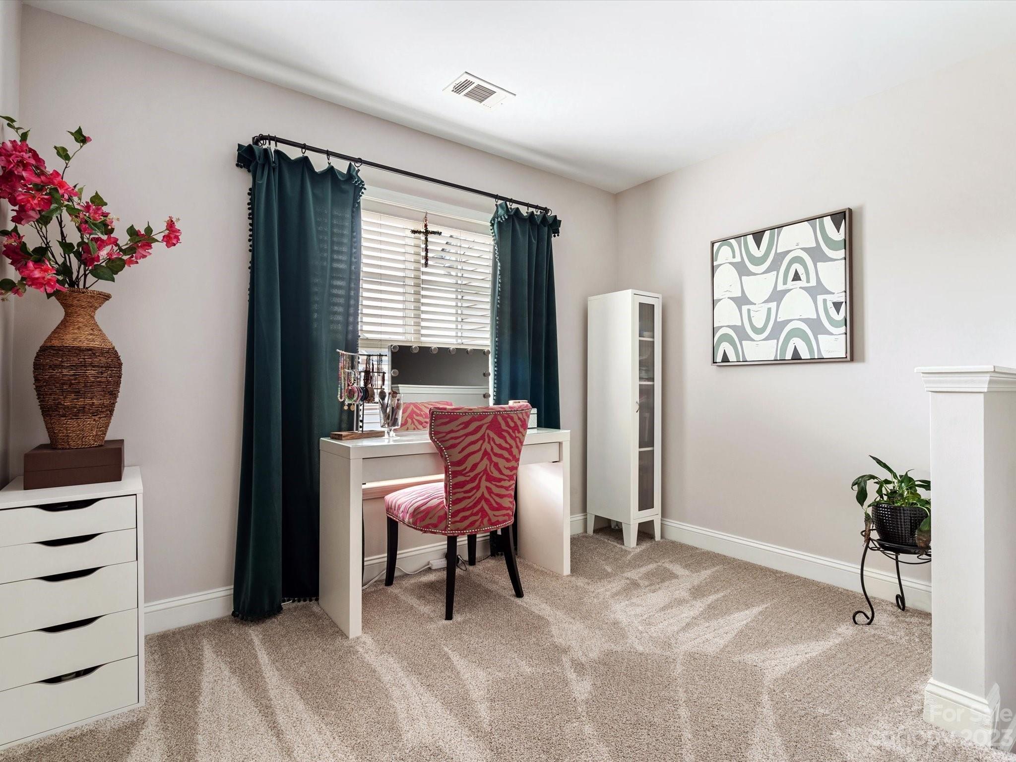 256 River Clay Road Fort Mill, SC 29708 - Photo 18 of 41 a living room with furniture and flowers