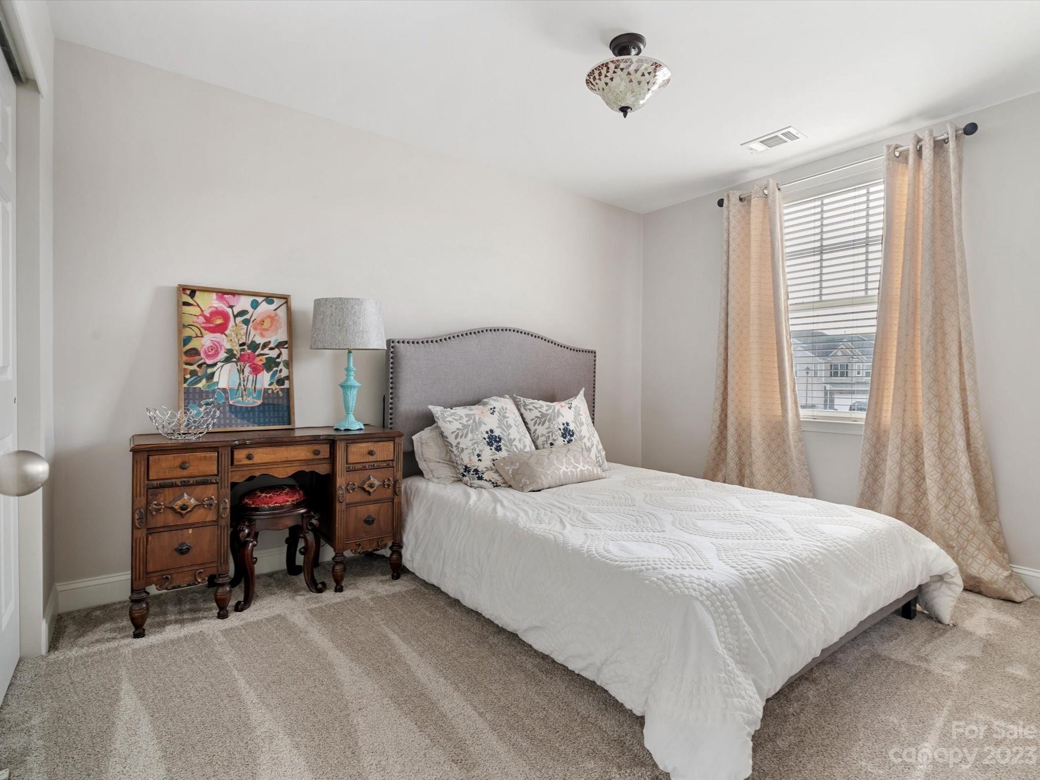 256 River Clay Road Fort Mill, SC 29708 - Photo 20 of 41 a bedroom with a bed and a window