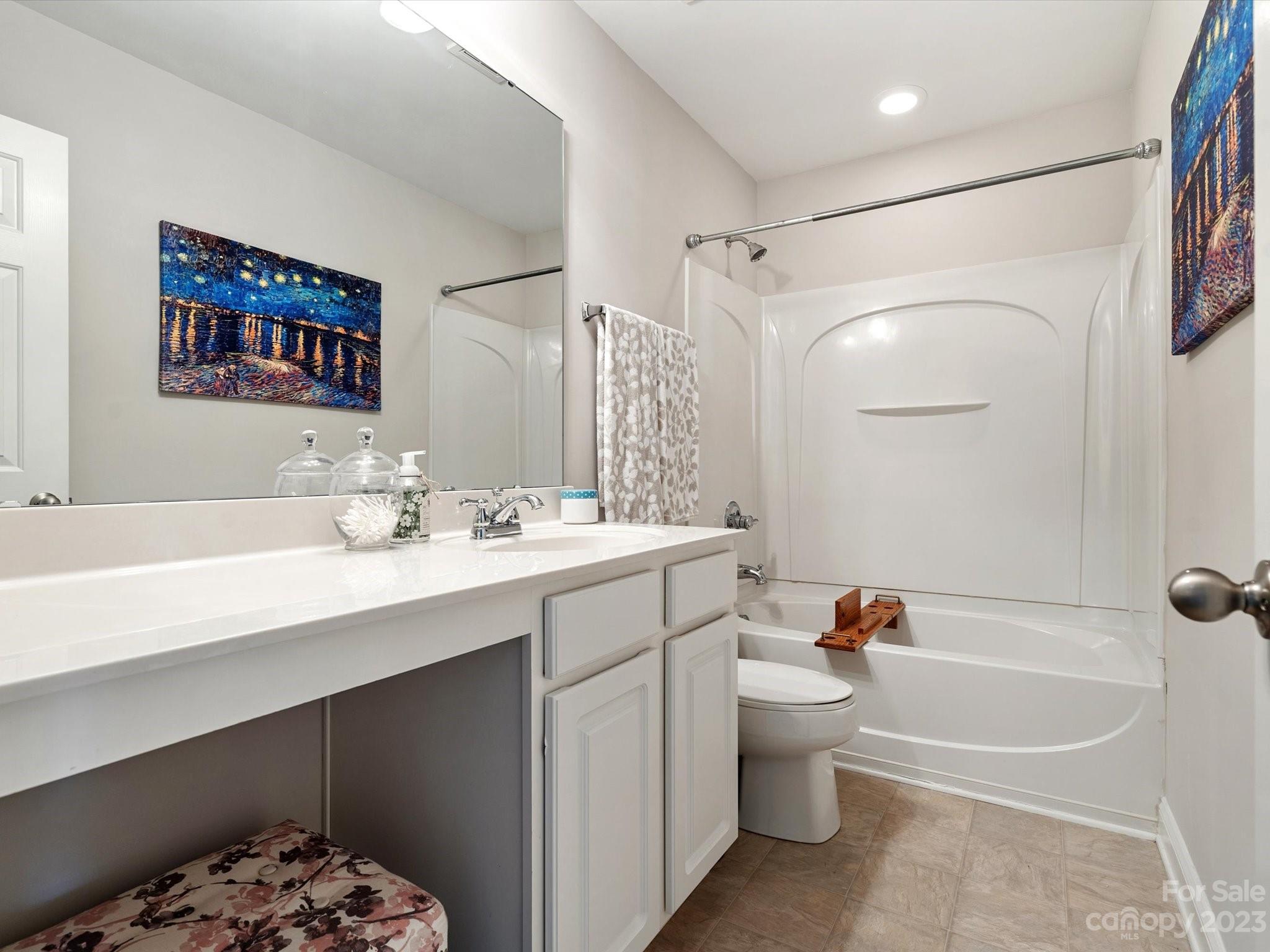 256 River Clay Road Fort Mill, SC 29708 - Photo 21 of 41 a bathroom with a sink a toilet and shower