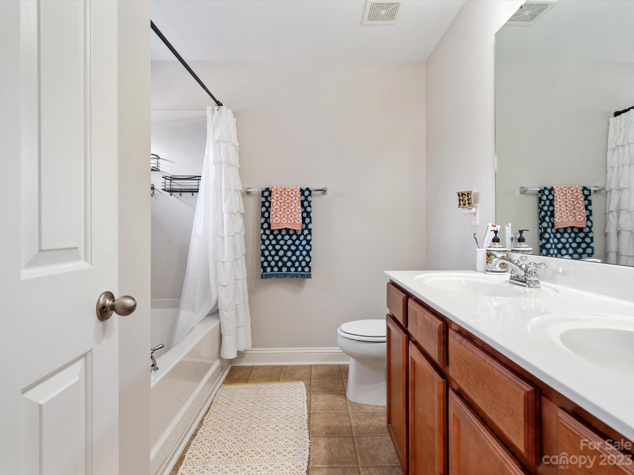 256 River Clay Road Fort Mill, SC 29708 - Photo 26 of 41 a bathroom with a sink toilet and shower