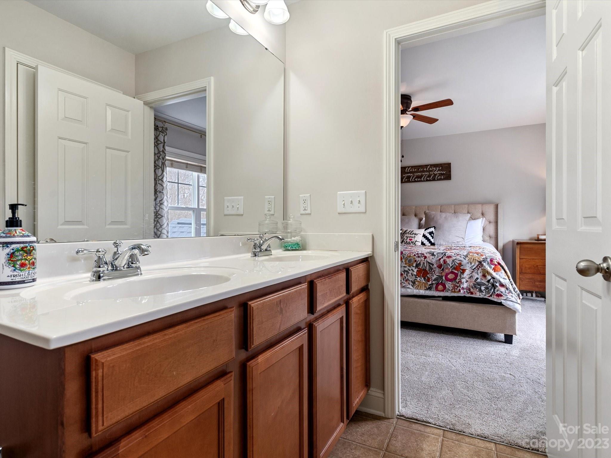 256 River Clay Road Fort Mill, SC 29708 - Photo 29 of 41 a en suite bathroom with a sink double vanity and a mirror