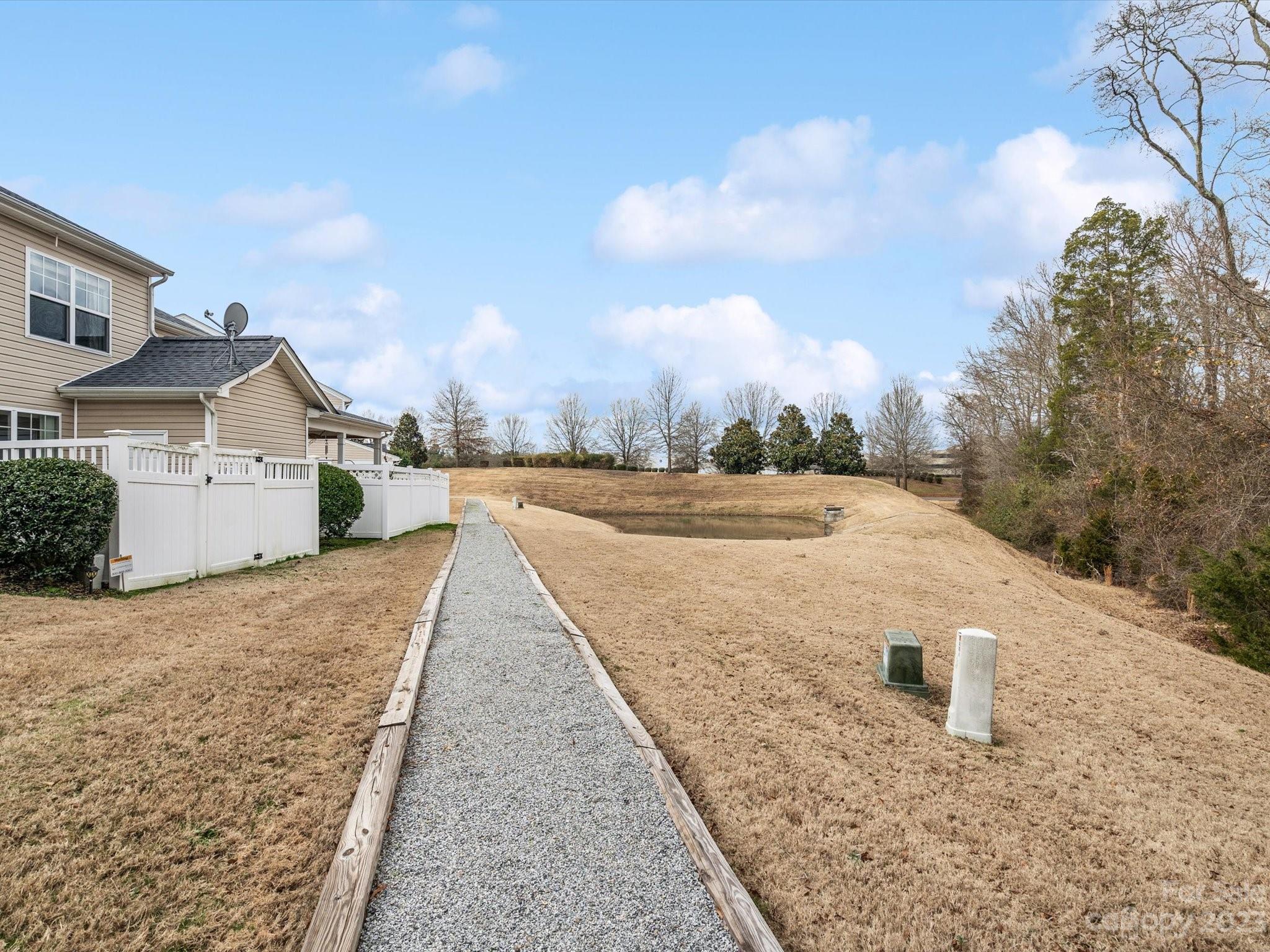 256 River Clay Road Fort Mill, SC 29708 - Photo 37 of 41 a view of white house with a yard