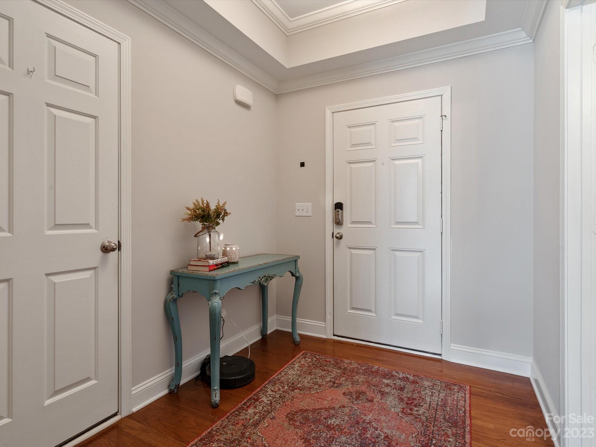 256 River Clay Road Fort Mill, SC 29708 - Photo 39 of 41 a view of an entryway with table and wooden floor