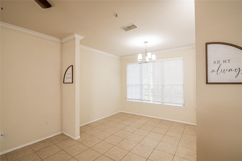 3391 South Kirkman Road, Unit 1216 Orlando, FL 32811 - Photo 13 of 33 a view of an empty room with a window