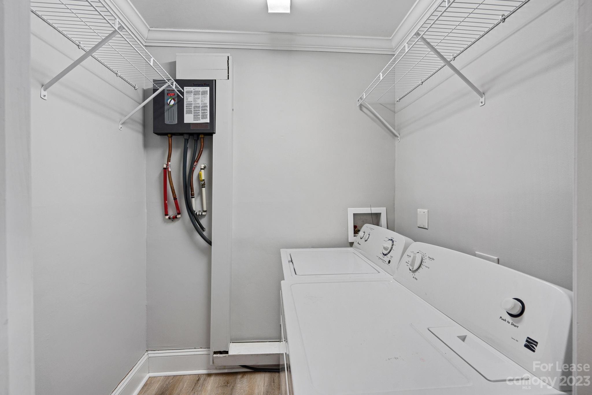2614 Park Road Charlotte, NC 28209 - Photo 13 of 19 a utility room with dryer and washer