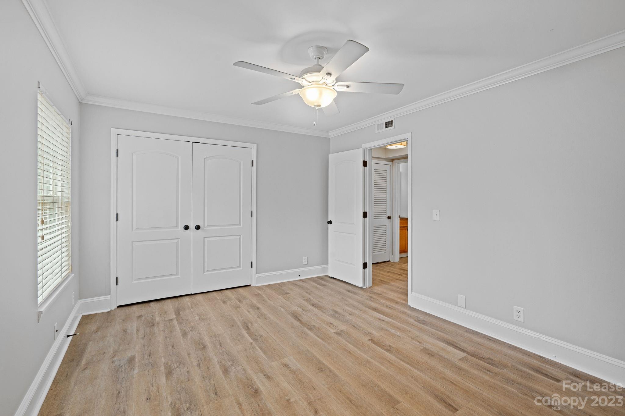 2614 Park Road Charlotte, NC 28209 - Photo 9 of 19 a view of an empty room with wooden floor