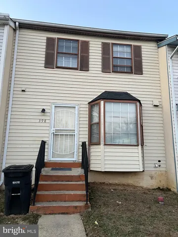 a front view of a house with a window