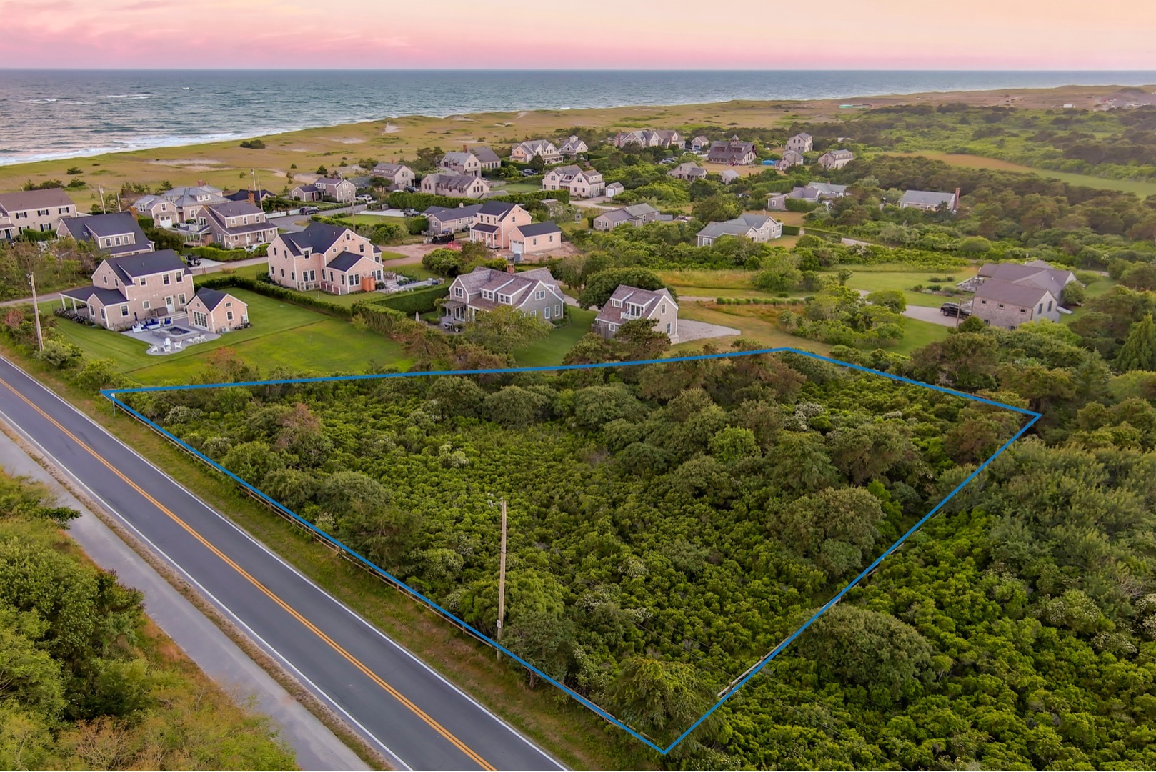 163 Surfside Road Nantucket, MA 02554 - Photo 1 of 7 a view of city and ocean
