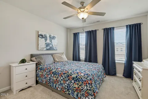 a bathroom with a sink double vanity and a mirror