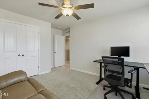a bathroom with a sink double vanity and a mirror
