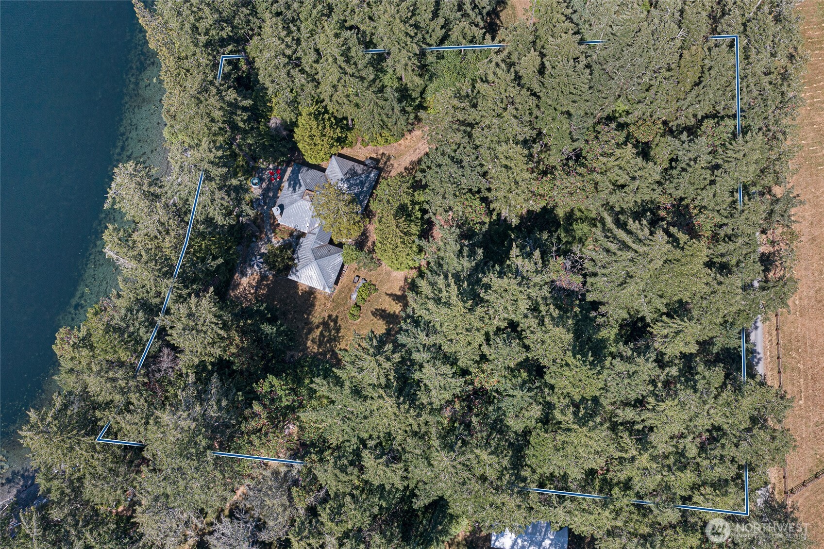 30 Smugglers Cove Road Friday Harbor, WA 98250 - Photo 12 of 39 a view of a house with a tree
