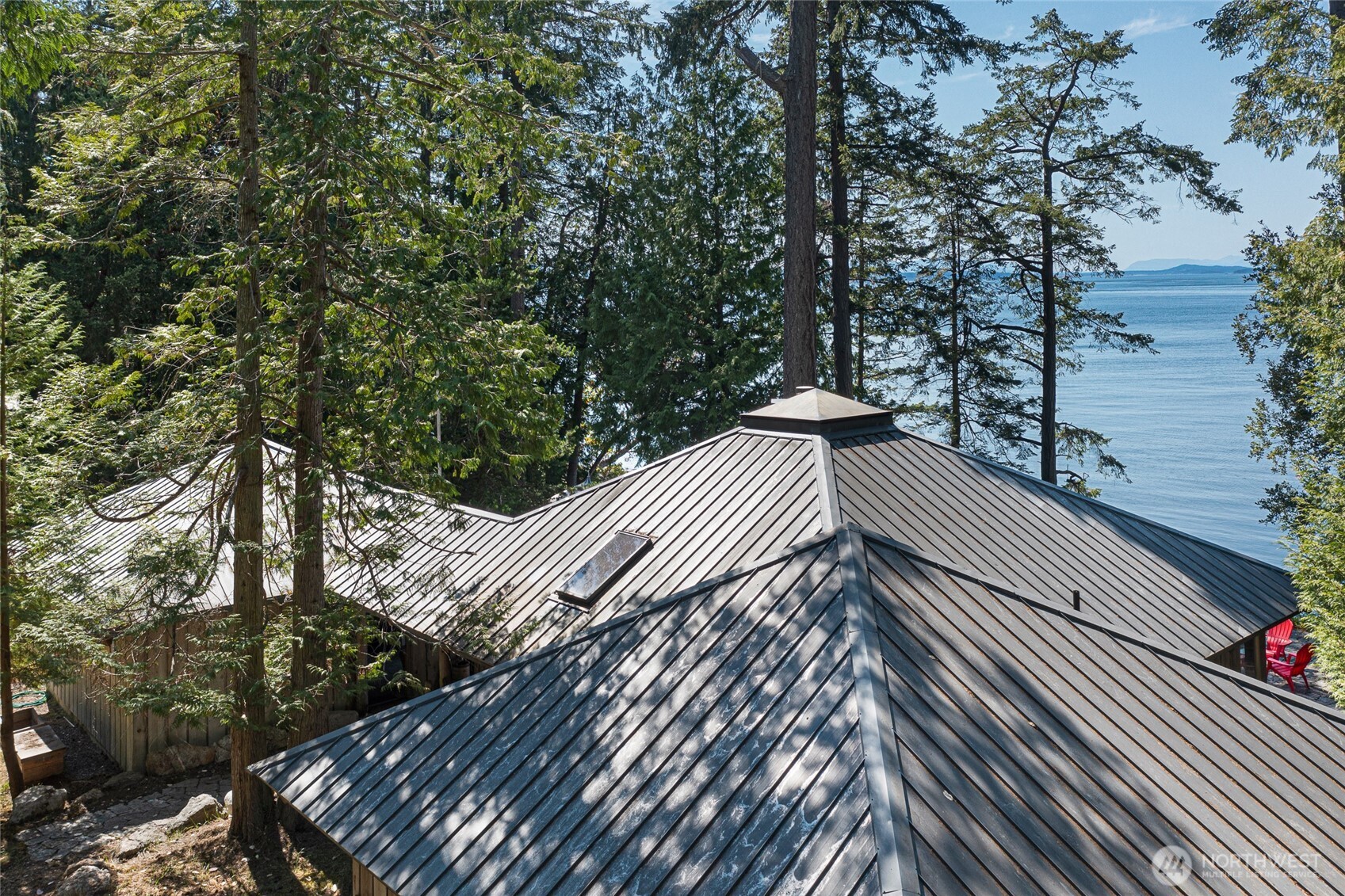 30 Smugglers Cove Road Friday Harbor, WA 98250 - Photo 19 of 39 a view of balcony with wooden floor and trees