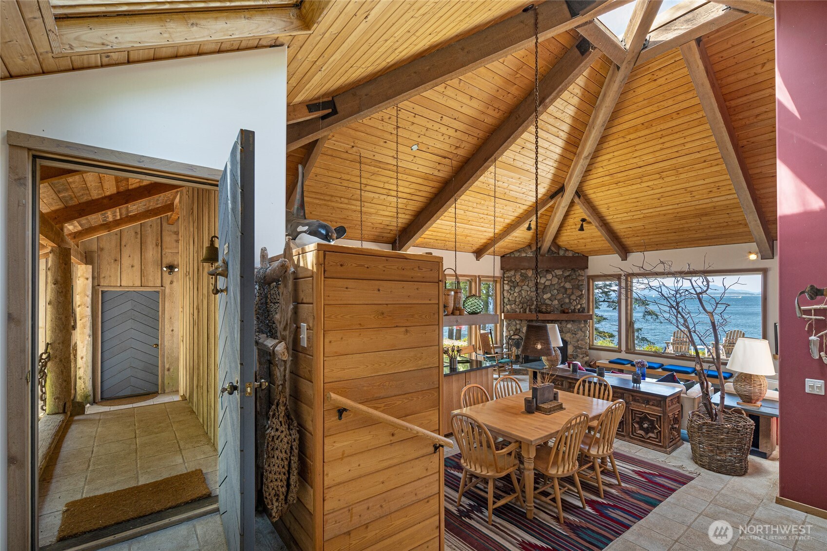 30 Smugglers Cove Road Friday Harbor, WA 98250 - Photo 20 of 39 a view of a patio with a table and chairs