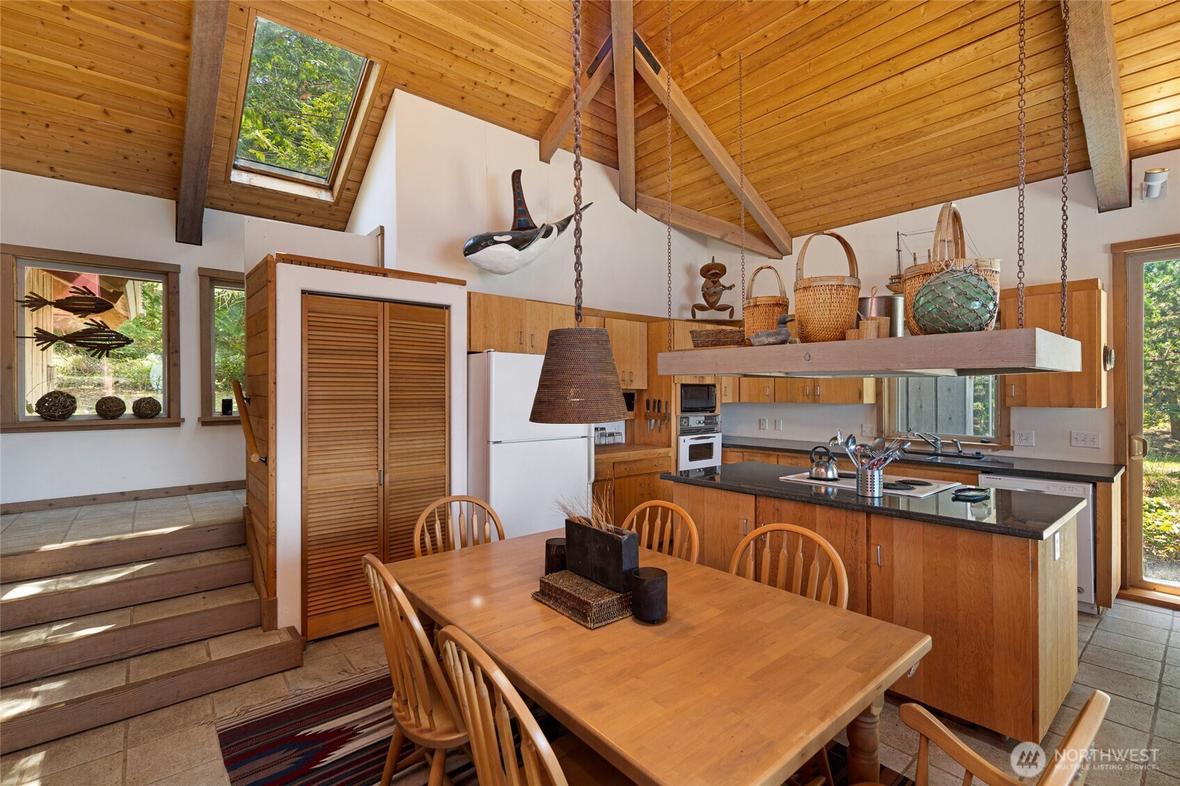 30 Smugglers Cove Road Friday Harbor, WA 98250 - Photo 23 of 39 a view of a patio with table and chairs
